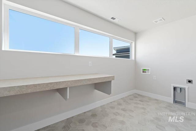 6150 S Binky Ave, Meridian, ID 83642 - laundry area with washer hookup, baseboards, and hookup for an electric dryer