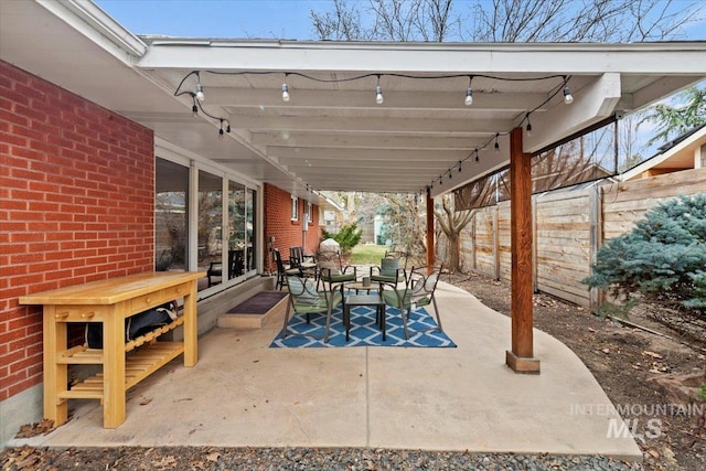 view of patio / terrace with fence