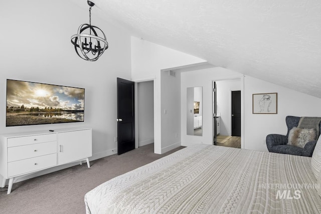 bedroom featuring a chandelier, a textured ceiling, light colored carpet, and vaulted ceiling