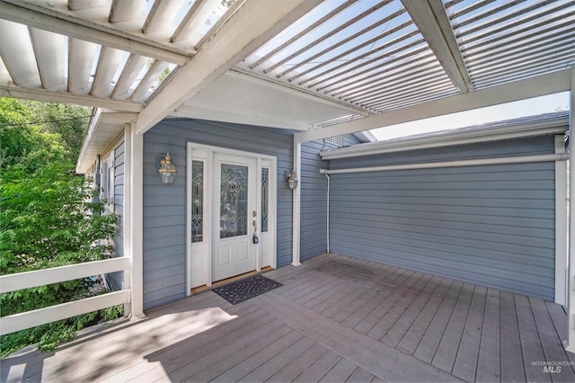 wooden deck featuring a pergola