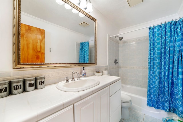 full bathroom featuring crown molding, shower / bath combo, vanity, and toilet