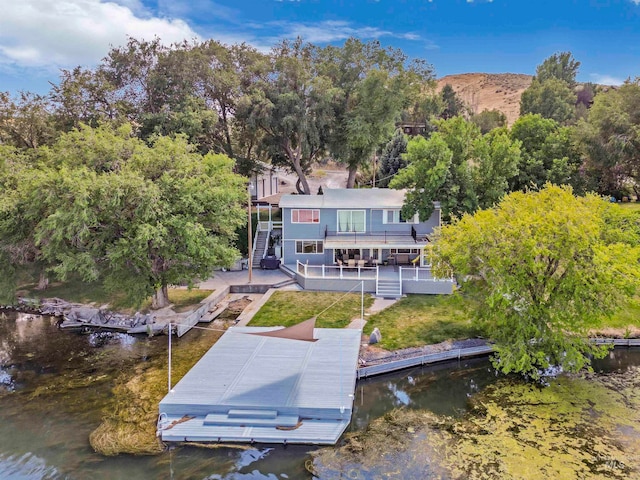 exterior space with a water view