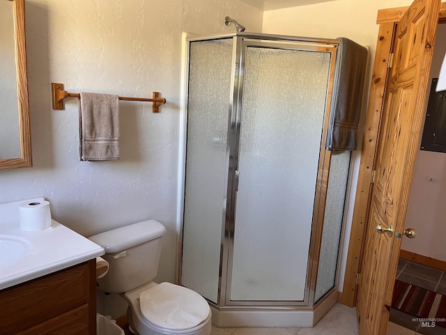 532 Warren Creek Rd, Warren, ID 83671 - bathroom featuring vanity, a stall shower, and tile patterned flooring