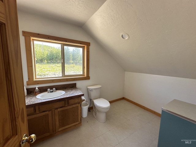 532 Warren Creek Rd, Warren, ID 83671 - bathroom featuring vaulted ceiling, a textured ceiling, and vanity