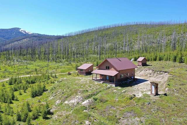 532 Warren Creek Rd, Warren, ID 83671 - view from above of property featuring a forest and a mountain backdrop