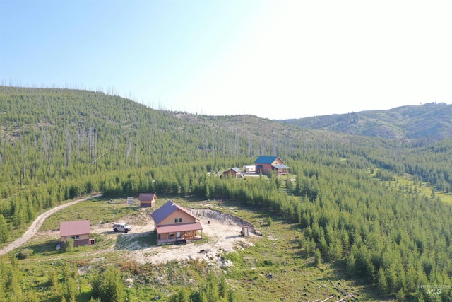 532 Warren Creek Rd, Warren, ID 83671 - aerial view of property's location with a forest and a mountainous background