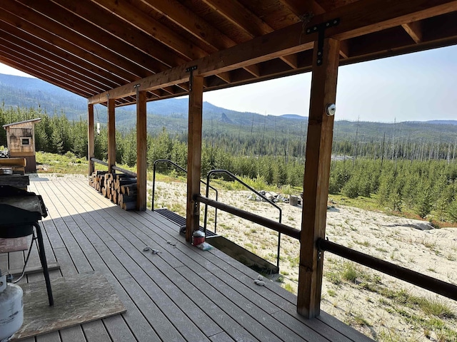 532 Warren Creek Rd, Warren, ID 83671 - wooden terrace with a mountain view and a view of trees
