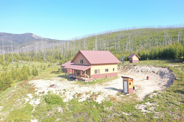 532 Warren Creek Rd, Warren, ID 83671 - view of subject property with a heavily wooded area and a mountain backdrop