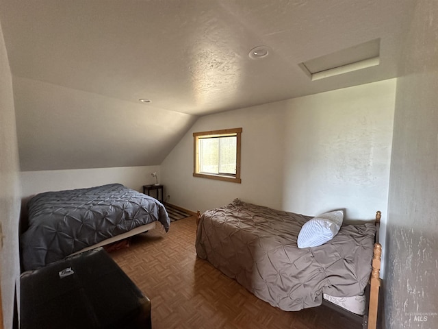 532 Warren Creek Rd, Warren, ID 83671 - bedroom featuring attic access, vaulted ceiling, and recessed lighting