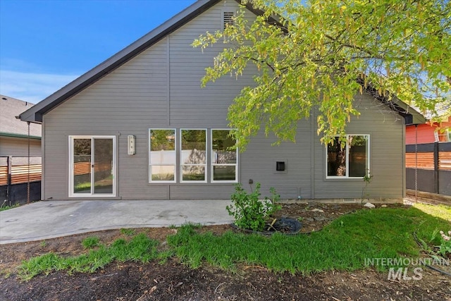 2249 N Eagle Creek Ln, Eagle, ID 83616 - back of property featuring a patio area and fence