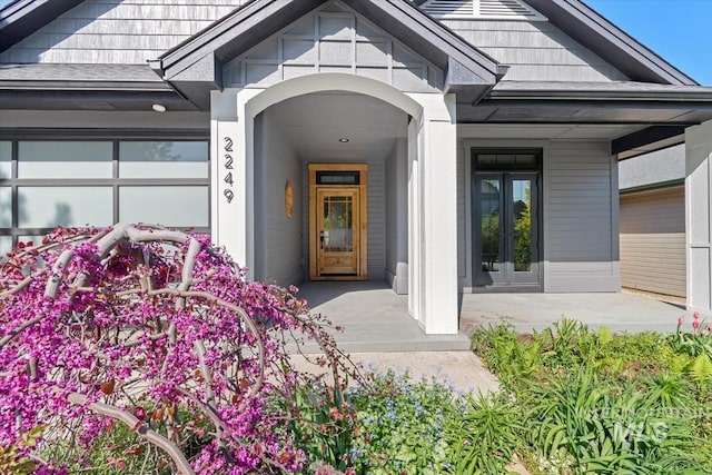 2249 N Eagle Creek Ln, Eagle, ID 83616 - view of exterior entry featuring a porch and french doors