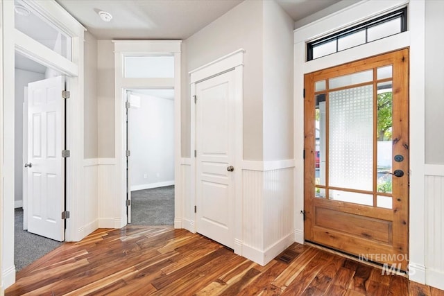 2249 N Eagle Creek Ln, Eagle, ID 83616 - entryway featuring wood finished floors and a wainscoted wall