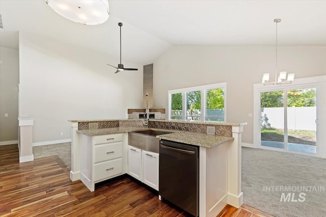 2249 N Eagle Creek Ln, Eagle, ID 83616 - kitchen featuring dishwasher, a chandelier, a sink, hanging light fixtures, and white cabinetry