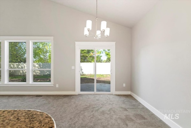 2249 N Eagle Creek Ln, Eagle, ID 83616 - carpeted empty room with a chandelier, vaulted ceiling, and baseboards