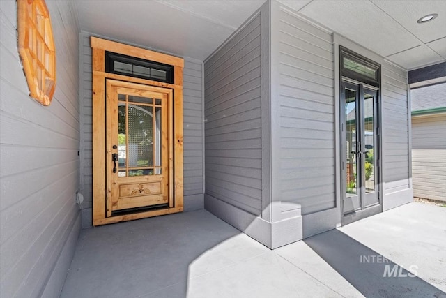 2249 N Eagle Creek Ln, Eagle, ID 83616 - property entrance with a porch and french doors