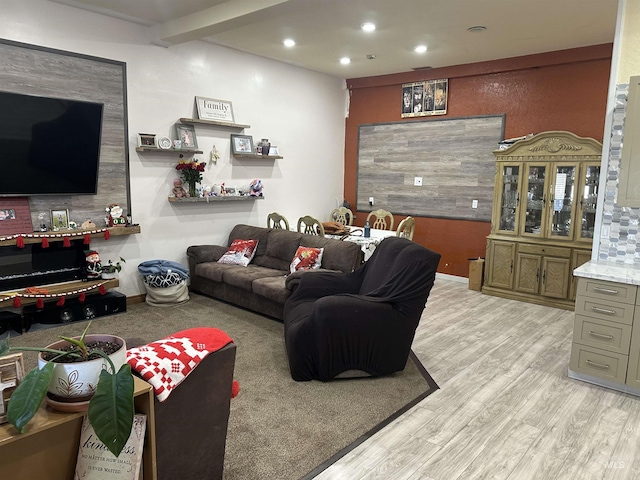 living room with light hardwood / wood-style flooring