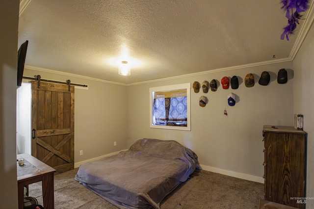 bedroom with a barn door, carpet, and ornamental molding
