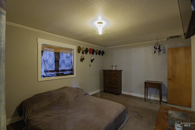bedroom featuring crown molding, a textured ceiling, carpet flooring, and baseboards