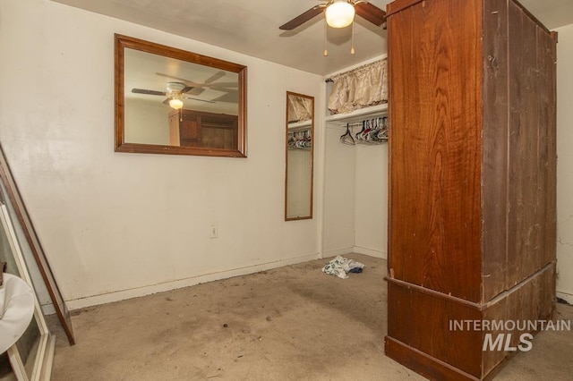 145 S 13th E, Mountain Home, ID 83647 - empty room with ceiling fan, unfinished concrete floors, and baseboards