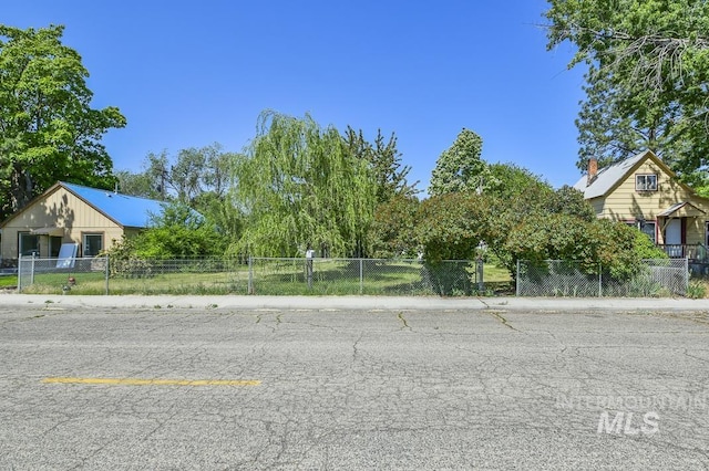 145 S 13th E, Mountain Home, ID 83647 - view of asphalt street with sidewalks and curbs