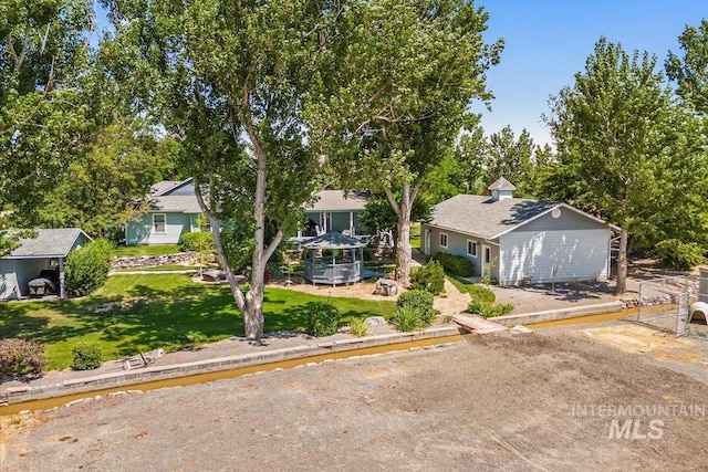 7425 Robinson Rd, Kuna, ID 83634 - view of front facade featuring a front yard