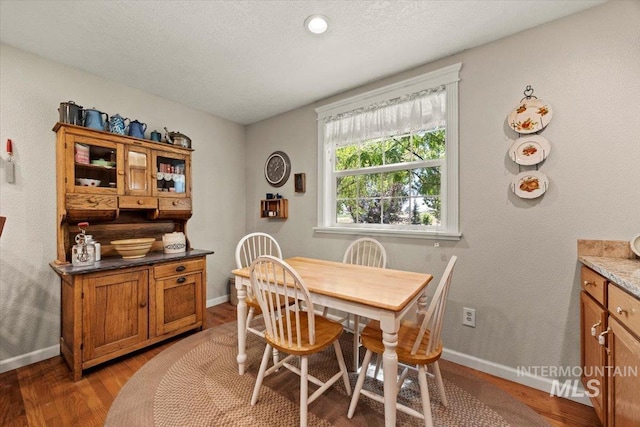 7425 Robinson Rd, Kuna, ID 83634 - dining area with baseboards and light wood-style floors