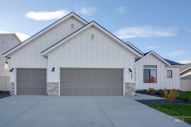 modern farmhouse with a garage