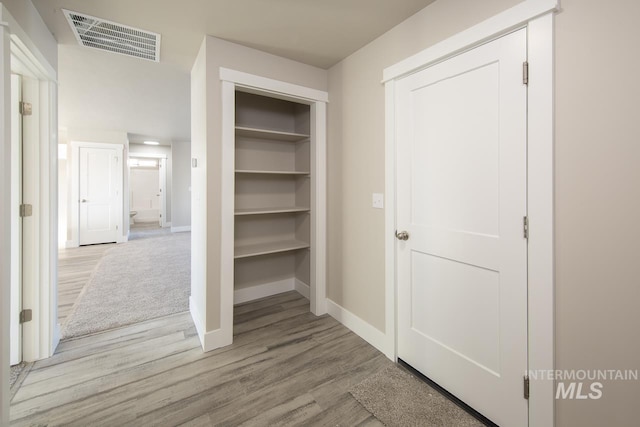 closet featuring visible vents