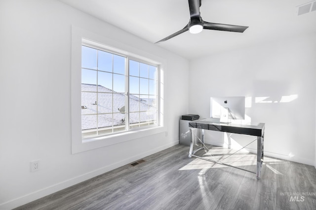 922 Victory Dr, Gooding, ID 83330 - office space with visible vents, baseboards, ceiling fan, and wood finished floors
