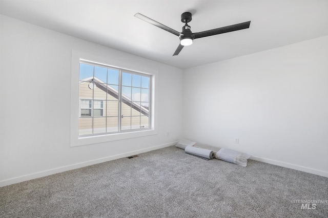 922 Victory Dr, Gooding, ID 83330 - carpeted empty room featuring visible vents, baseboards, and a ceiling fan