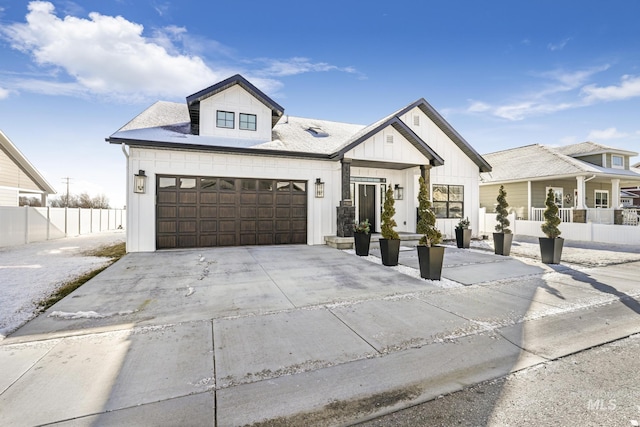 922 Victory Dr, Gooding, ID 83330 - modern farmhouse with board and batten siding, concrete driveway, and fence