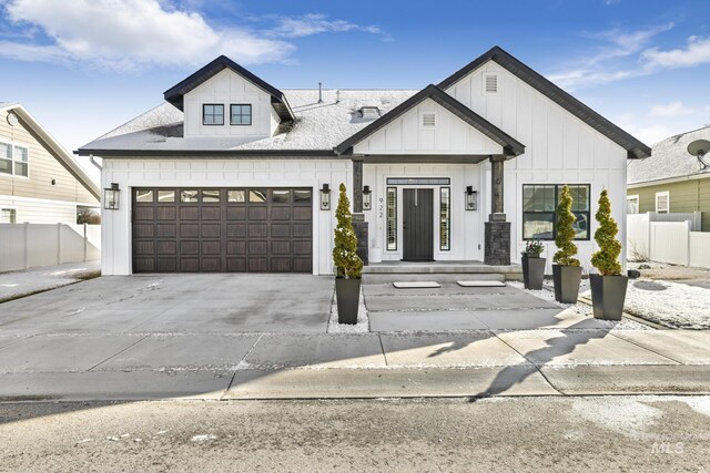 922 Victory Dr, Gooding, ID 83330 - modern inspired farmhouse with board and batten siding, concrete driveway, and fence