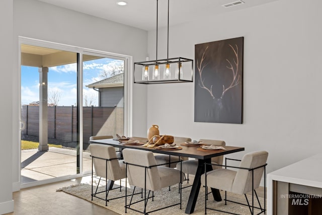 6920 N Spencer Way, Meridian, ID 83646 - dining area with light wood-style flooring, recessed lighting, and baseboards