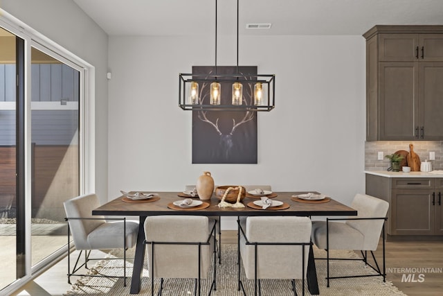 6920 N Spencer Way, Meridian, ID 83646 - dining space featuring light wood-style flooring