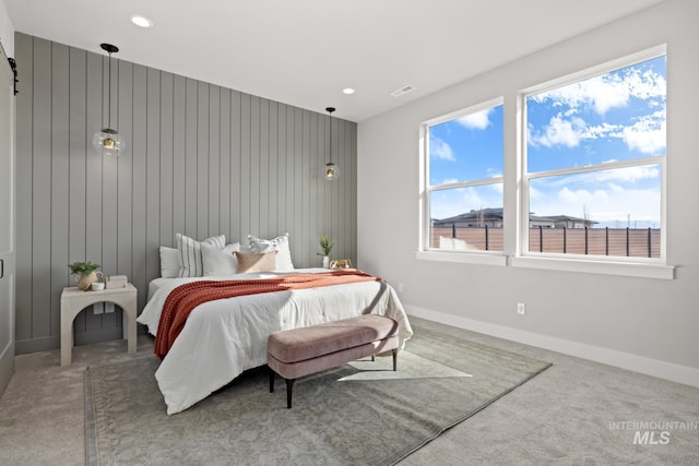 6920 N Spencer Way, Meridian, ID 83646 - carpeted bedroom featuring baseboards, recessed lighting, and wood walls
