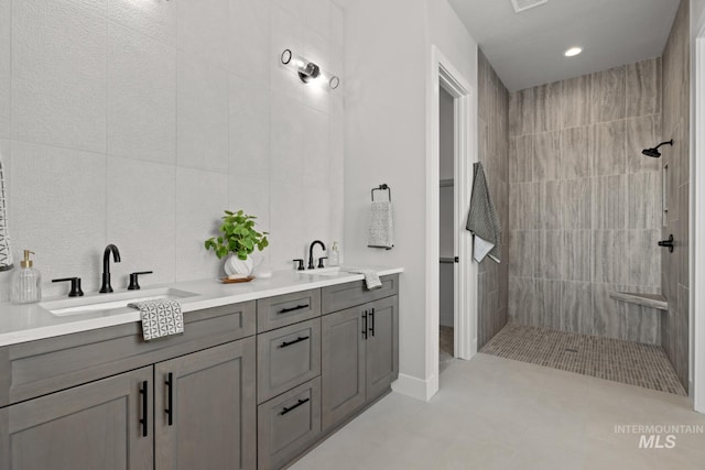 6920 N Spencer Way, Meridian, ID 83646 - bathroom with a walk in shower, double vanity, and recessed lighting