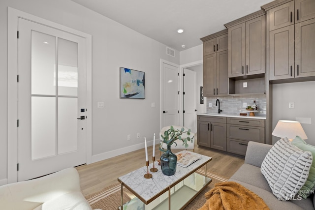 6920 N Spencer Way, Meridian, ID 83646 - living area featuring light wood-type flooring, baseboards, and recessed lighting