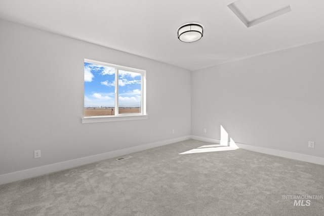 6920 N Spencer Way, Meridian, ID 83646 - spare room featuring attic access, carpet, and baseboards