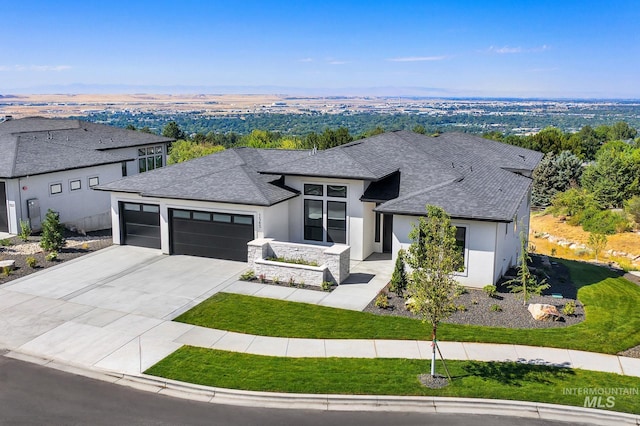 view of front of property with a garage