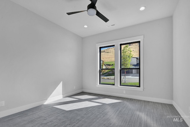 empty room featuring ceiling fan