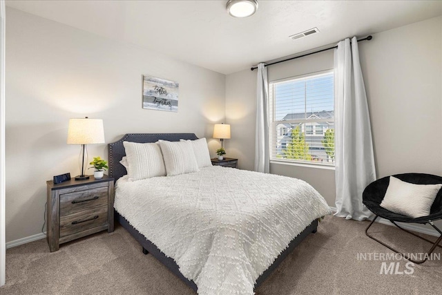 4447 W Everest St, Meridian, ID 83646 - bedroom featuring carpet floors, baseboards, and visible vents