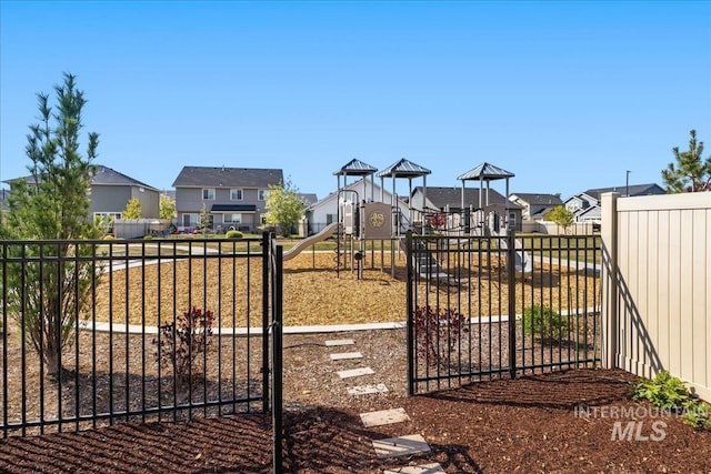 4447 W Everest St, Meridian, ID 83646 - view of gate featuring a residential view and fence