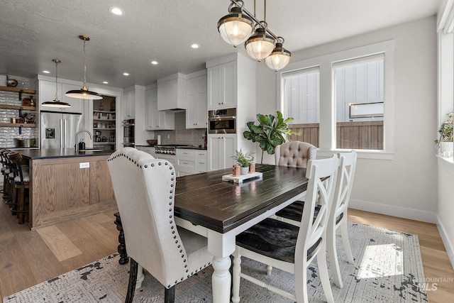 5209 W Strant Steet, Eagle, ID 83616 - dining room featuring recessed lighting and light wood-style floors