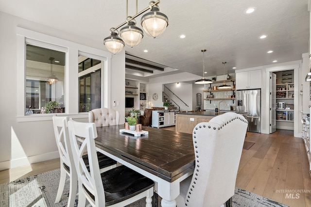5209 W Strant Steet, Eagle, ID 83616 - dining space featuring recessed lighting and wood finished floors
