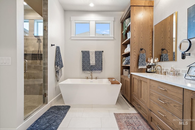 5209 W Strant Steet, Eagle, ID 83616 - full bathroom with a freestanding tub, vanity, and a stall shower