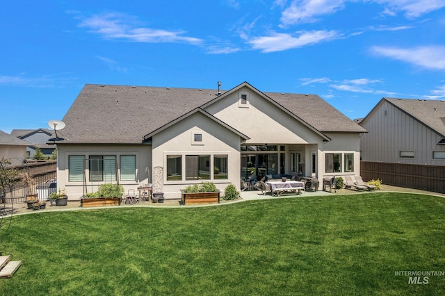 5209 W Strant Steet, Eagle, ID 83616 - rear view of property with a patio area, stucco siding, a fenced backyard, outdoor lounge area, and a shingled roof