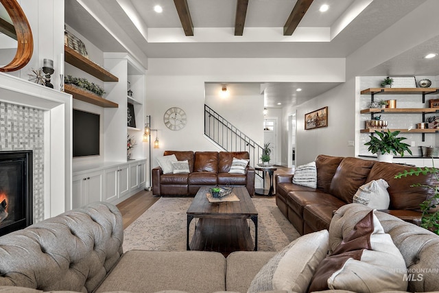 5209 W Strant Steet, Eagle, ID 83616 - living room featuring light wood finished floors, beam ceiling, stairs, recessed lighting, and built in shelves