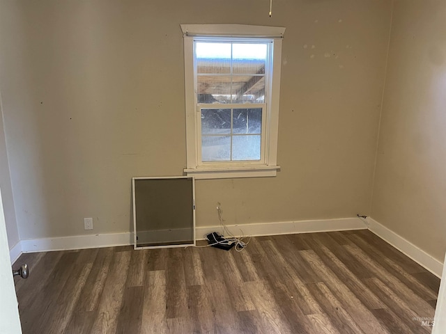 512 19th Ave S, Nampa, ID 83651 - empty room featuring wood finished floors and baseboards