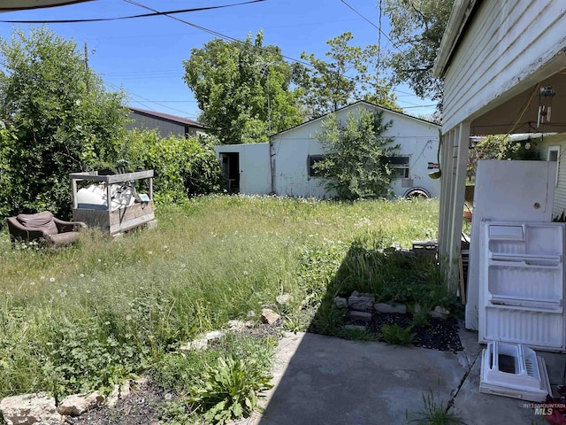 512 19th Ave S, Nampa, ID 83651 - view of yard featuring a patio area