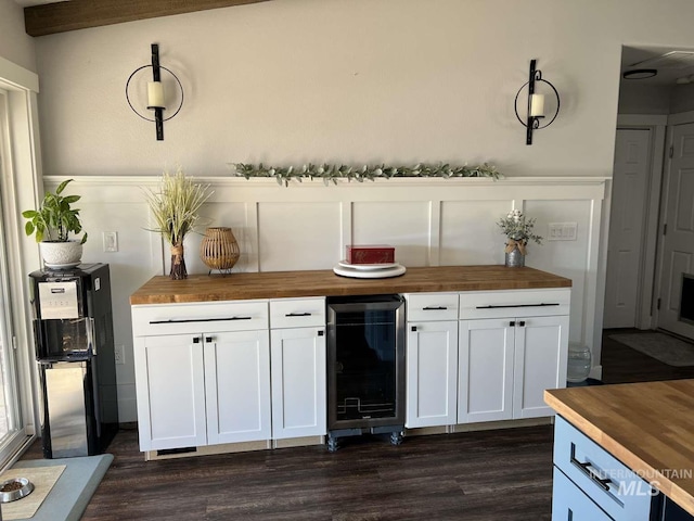 bar with dark wood-style floors and wine cooler